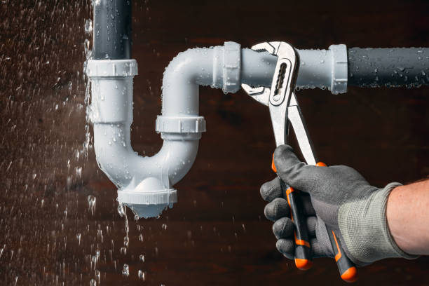 Professional Emergency Plumber technician working in Canton, MA